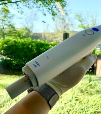 Medit i700 held in garden
